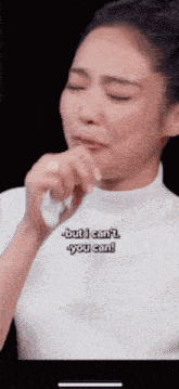 a woman is crying and saying but i can 't you can !