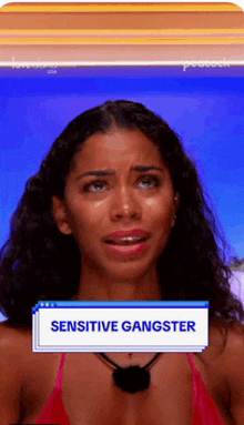 a woman in a red bikini is crying and has sensitive gangster written on her screen