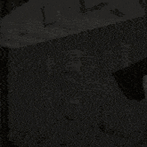 a video game character named gavin is sitting in a chair