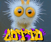 a picture of a furry creature with the word loved written in graffiti