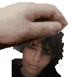 a hand is holding a person 's head in front of a white background