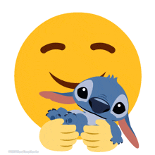 a yellow smiley face with stitch laying on it