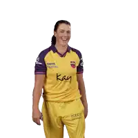 a woman in a yellow and purple shirt with kay written on it