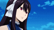 a girl with long dark hair and red eyes is wearing a blue dress