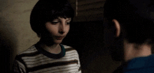 a young boy is talking to another person and the words me too are on the screen