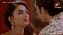 a man and a woman are looking at each other with a star plus logo in the corner