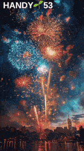 fireworks are displayed over a body of water with the words handy 53 above them