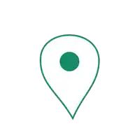 a green pin with a green circle in the middle on a white background