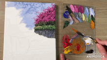 a painting is being painted on a canvas with the words made in animotica on the bottom right