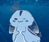 a cartoon drawing of a blue rabbit with a hat on