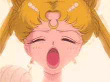 a close up of a girl 's face with her eyes closed and her mouth open
