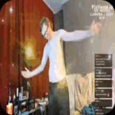 a man is dancing in a room with a sign that says pixverse