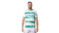a man is wearing a green and white hofmann jersey