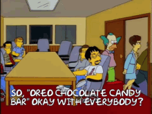 a cartoon of a group of people sitting around a table with the words " oreo chocolate candy bar "