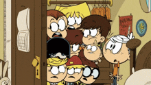 a group of loud house characters standing in a doorway