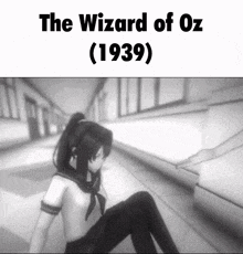 a black and white photo of a girl with the words the wizard of oz 1939