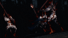 a blurry picture of a group of people fighting each other