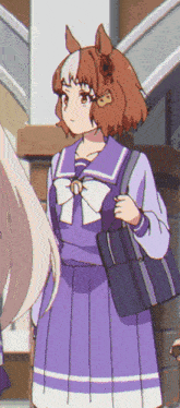 a girl in a purple dress with a horse on her head is holding a black bag .