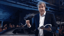 Top Gear Jeremy Clarkson GIF - Top Gear Jeremy Clarkson Read GIFs