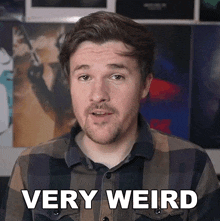 a man in a plaid shirt says very weird in white letters