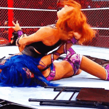 Becky Lynch Disarm Her GIF - Becky Lynch Disarm Her Sasha Banks GIFs