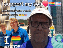 a man wearing an adidas hat stands in front of a statue of liberty and two boys
