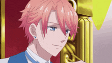 a man with pink hair and blue eyes is sitting in a chair