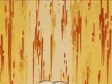 a close up of a cartoon dog 's head with blood coming out of it .