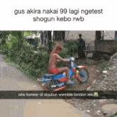 a man without a shirt is riding a motorcycle down a road .