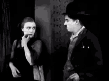 Charlie Chaplin Flirting GIF - Charlie Chaplin Flirting Flirt GIFs