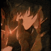 a man is lighting a cigarette with a lighter .