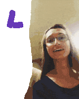 a woman with glasses and a purple letter l