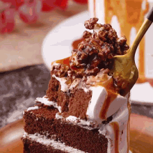 a close up of a piece of cake with a spoon on it