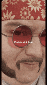 a close up of a man wearing glasses and a bandana with the words fuckin sick brah