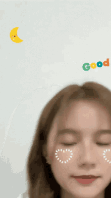 a woman with a heart on her face and the words good night above her head
