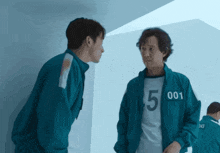 a man with the number 5 on his jacket