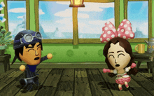 a boy and a girl are playing a video game and the girl has a pink bow on her head