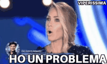 a woman with a surprised look on her face and the words ho un problema on the bottom
