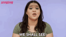 a woman says " we shall see " in front of a seventeen ad
