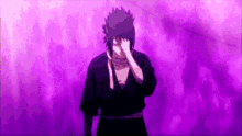 a man in a black shirt is standing in front of a purple background .