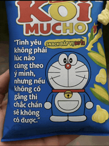 a blue bag of koi mucho snacks with doraemon on the front