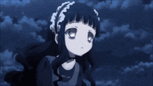 a girl with long black hair and a white headband looks sad