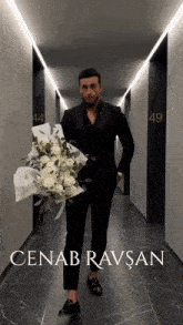 cenab ravsan is the name of the man holding a bouquet