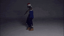 a man wearing a hat and a jersey that says ' boston ' on it