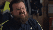 a man with a beard and glasses says " just sickening "