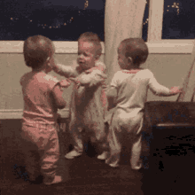 4babies Cant Stop Hugging Hugs GIF - 4babies Cant Stop Hugging Hugs Babies GIFs