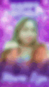 a purple background with a blurred image of a frog