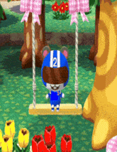 a bear wearing a blue and white helmet with the number 2 on it is sitting on a swing