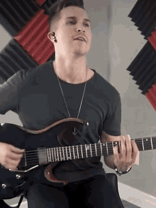 Strums The Guitar Cole Rolland GIF - Strums The Guitar Cole Rolland Playing The Guitar GIFs