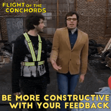 two men standing next to each other with the words " be more constructive with your feedback " below them
